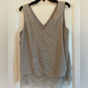 BUNDLE + SAVE! 3 for $25 on $10 items. Sleeveless blouse with lace detail